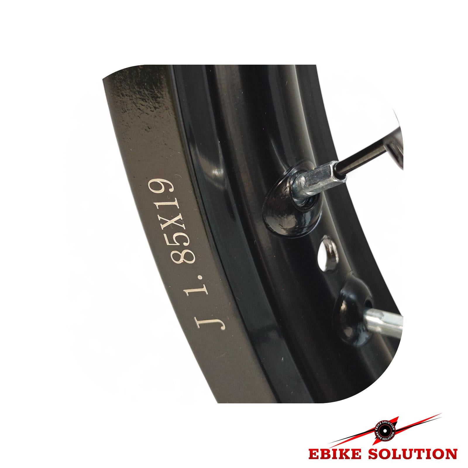 Close-up of a black bicycle wheel with size marking '1.85x19' on a white background, featuring the 'Ebike Solution' brand.