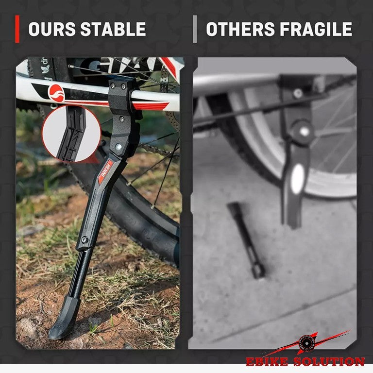 Bicycle kickstand with 'Ours Stable' text on a black background