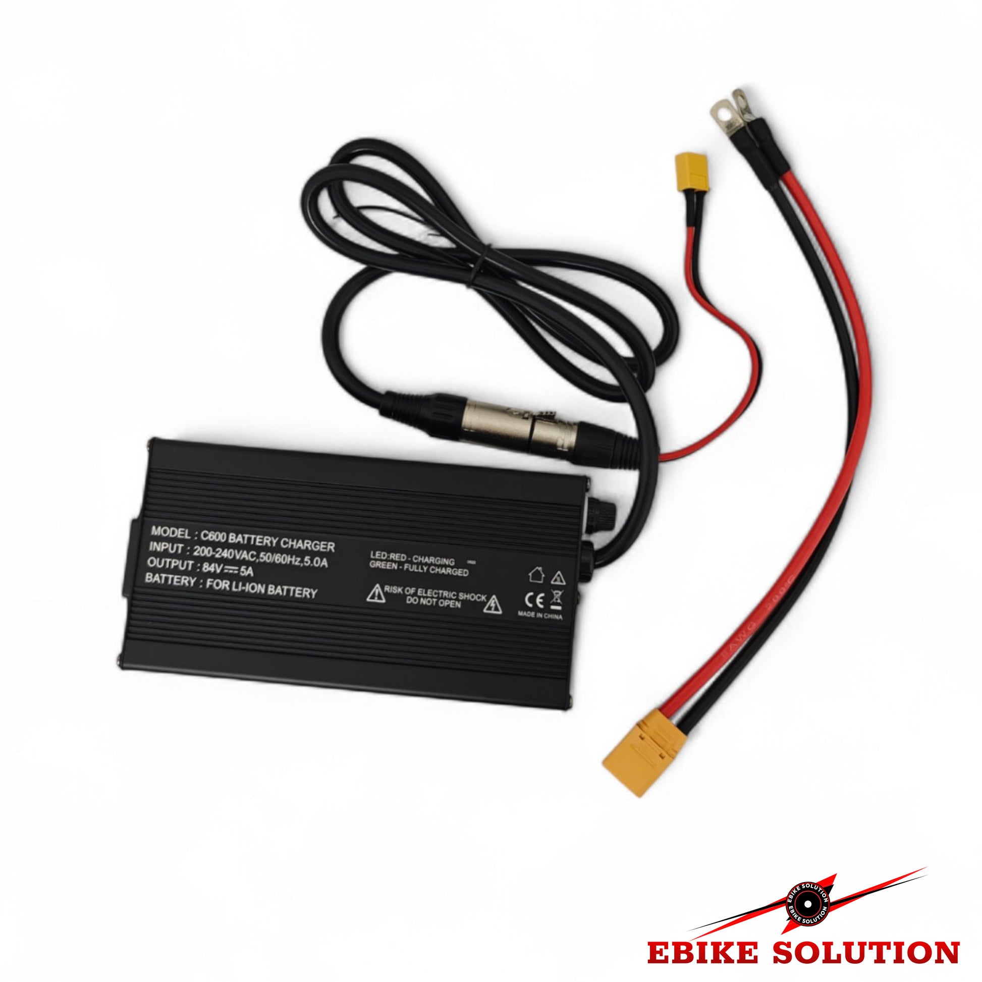 Battery charger with cables on a white background, branded 'Ebike Solution'.
